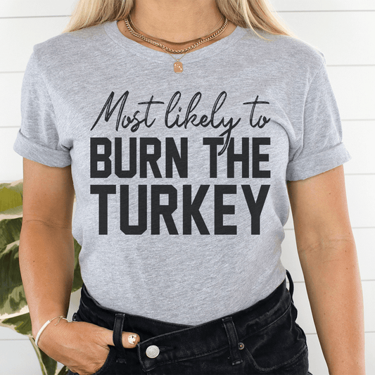 Most Likely To Burn The Turkey Thanksgiving Tee-0